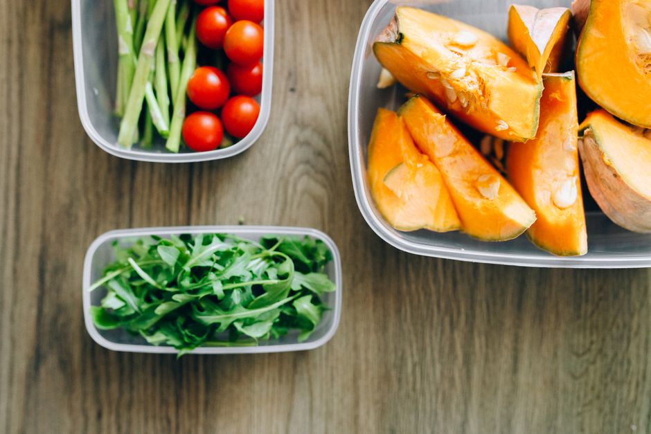 Lunchbox compartments filled with vegetables and fruit
